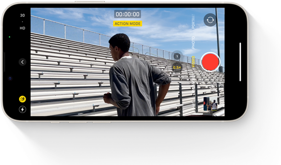 A frame of an Action mode clip showing a person running up a set of stairs.